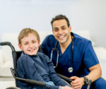 Paediatrician consulting with a child in a wheelchair, assessing development and providing diagnostic and functional evidence for NDIS support.